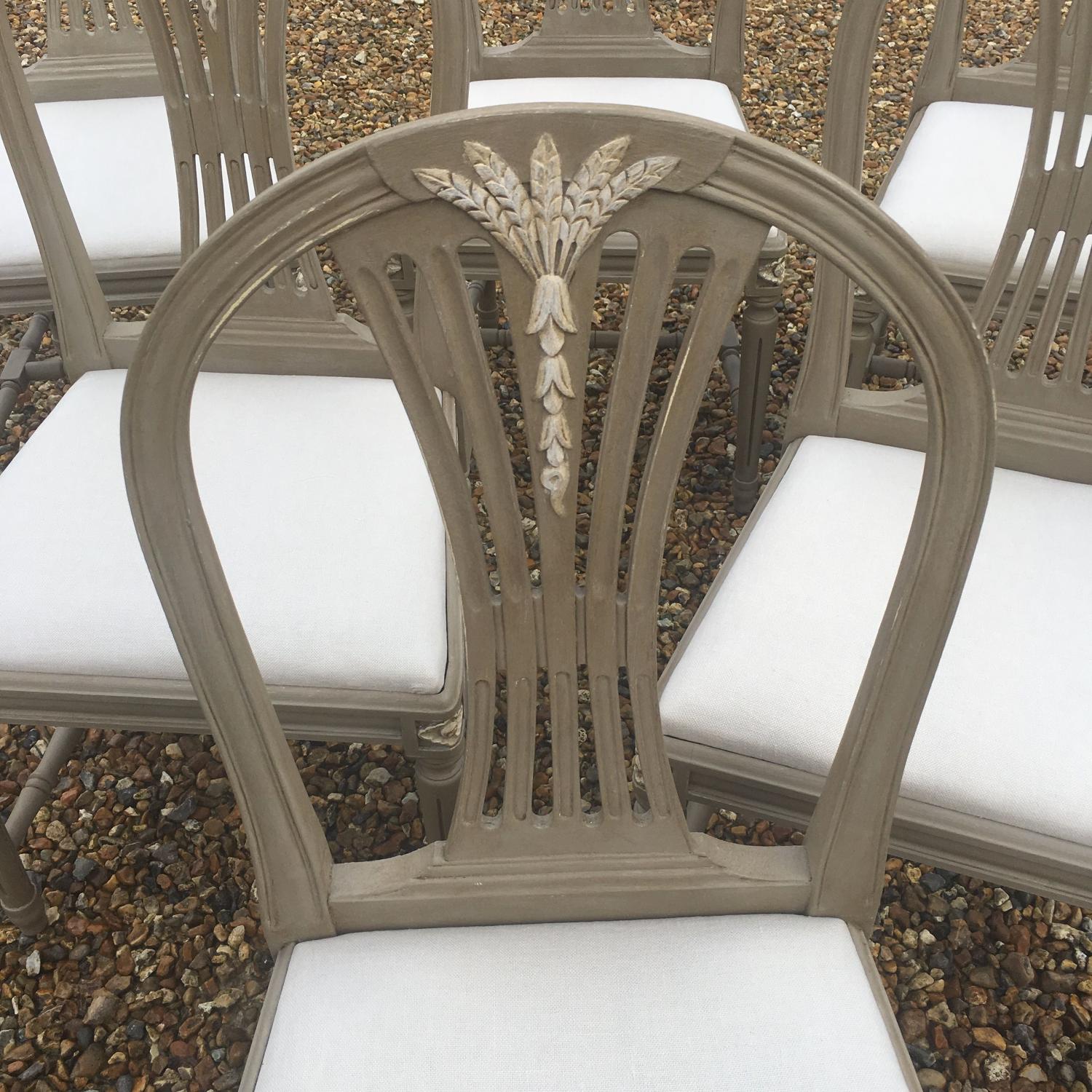 Six 1950s painted Swedish dining chairs with natural linen seats