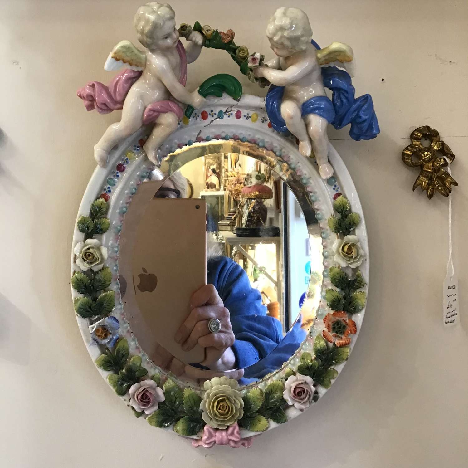 Antique china cherub mirror with flowers