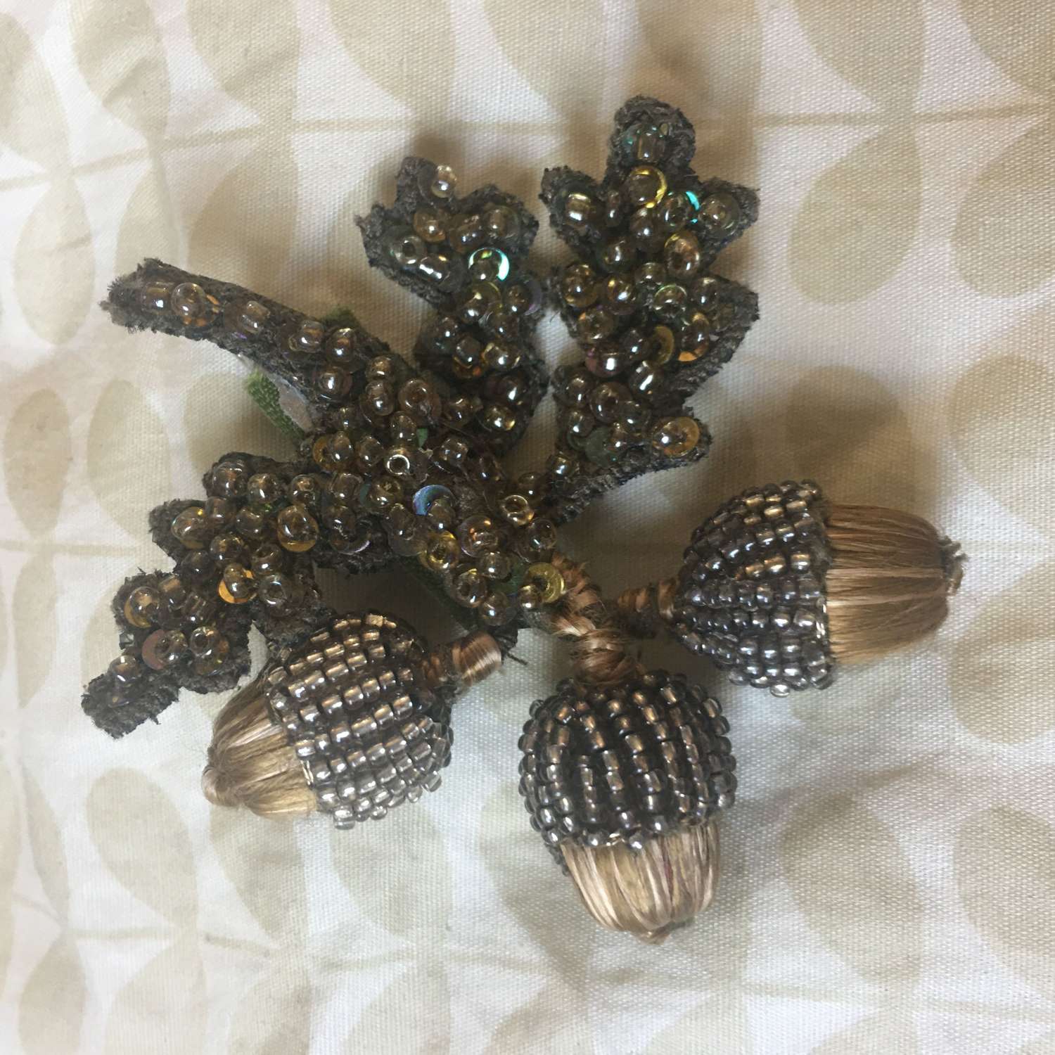 Acorn brooch with three beaded acorns