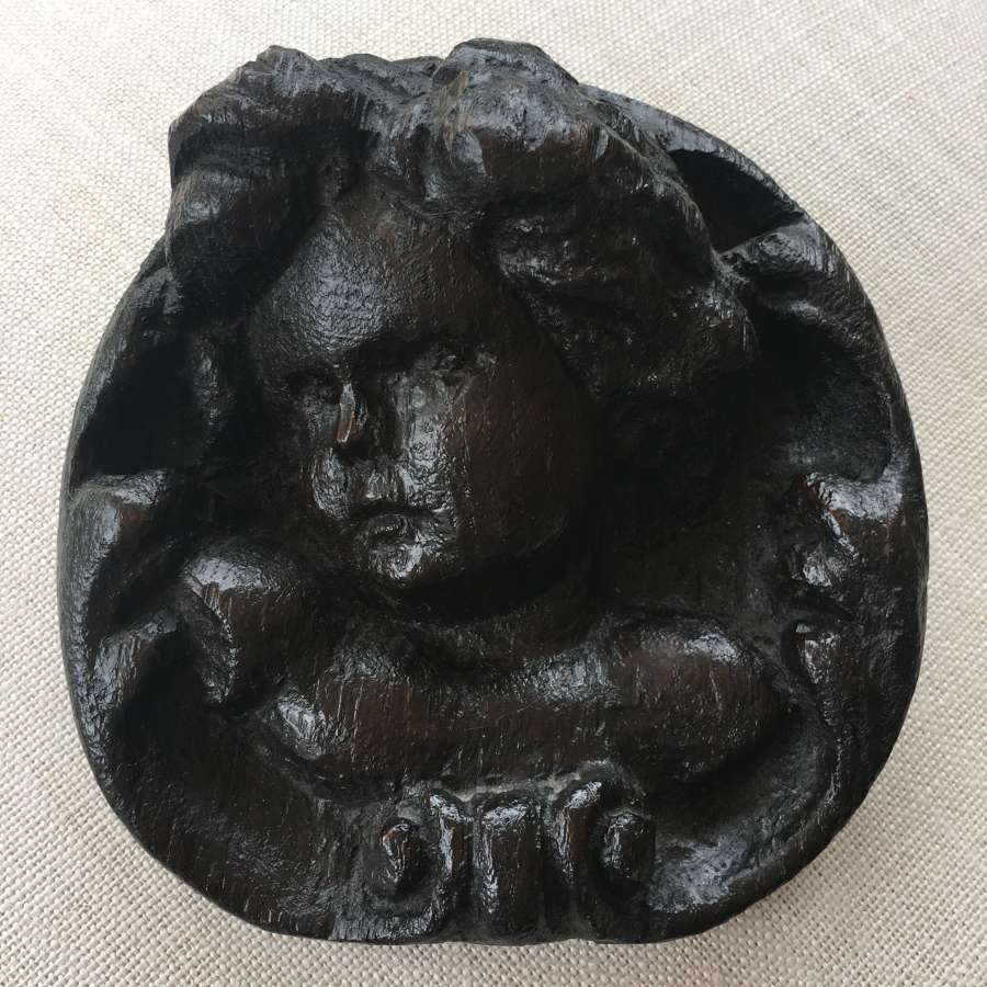 19th century wooden putti wall hanging