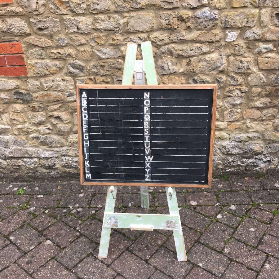Vintage green painted easel and blackboard