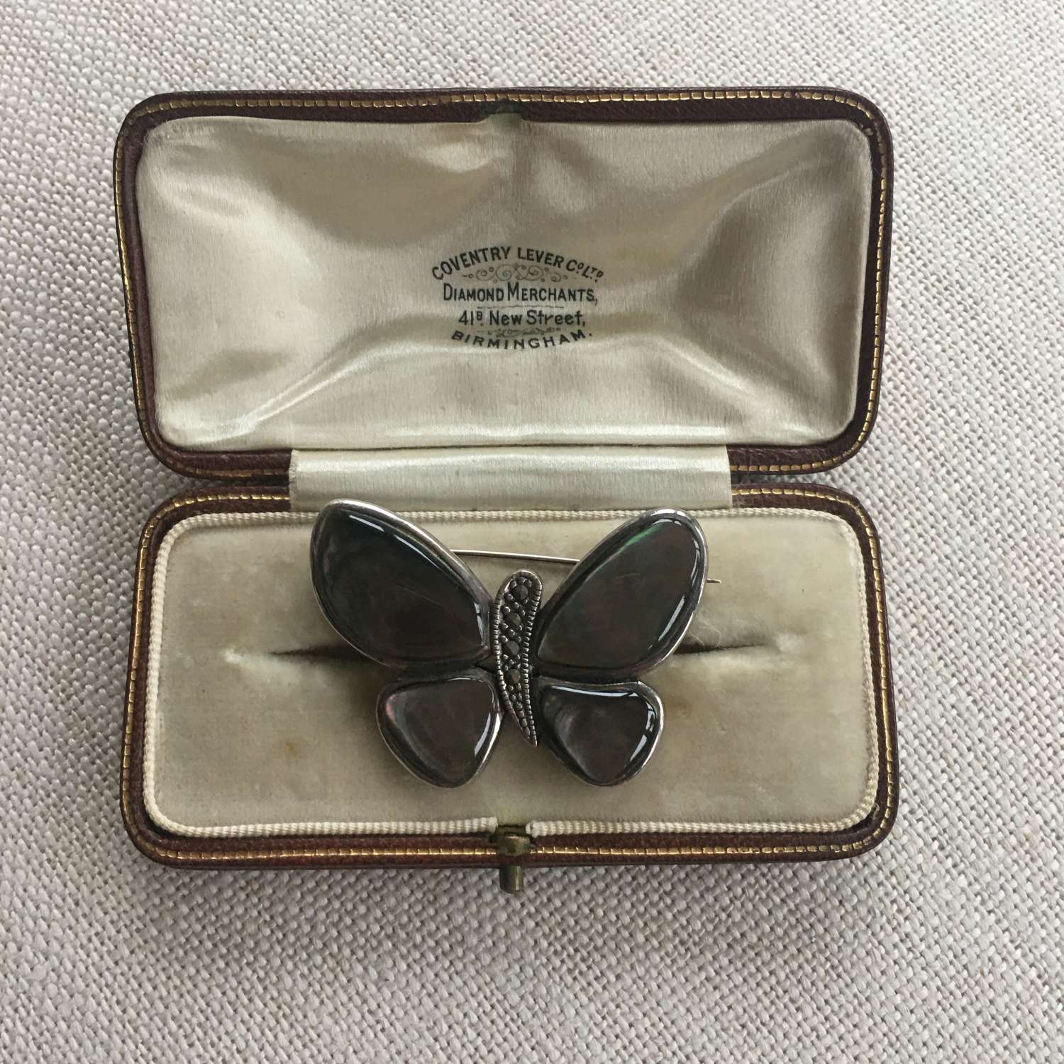 Brown abalone shell, marcasite and silver butterfly brooch