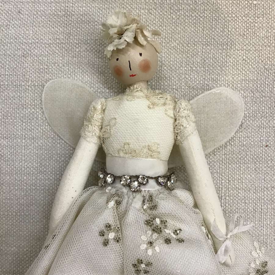 Handcrafted cloth fairy doll using vintage fabrics and trims
