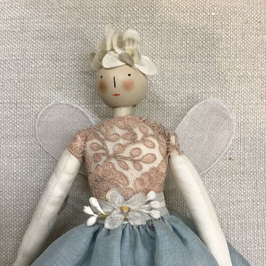 Handcrafted cloth fairy doll made with vintage fabric and trims