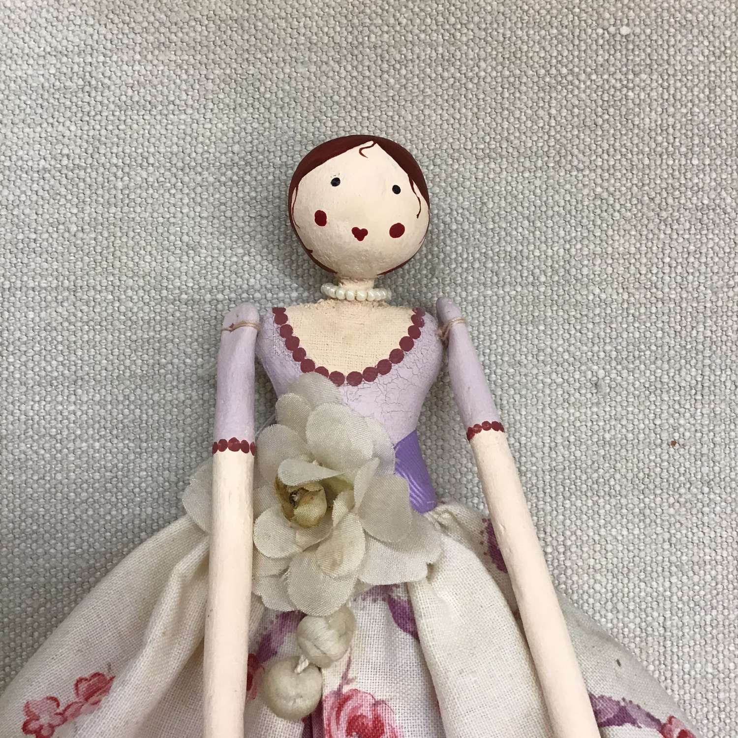 Hand crafted paper clay doll dressed in vintage fabric and trims