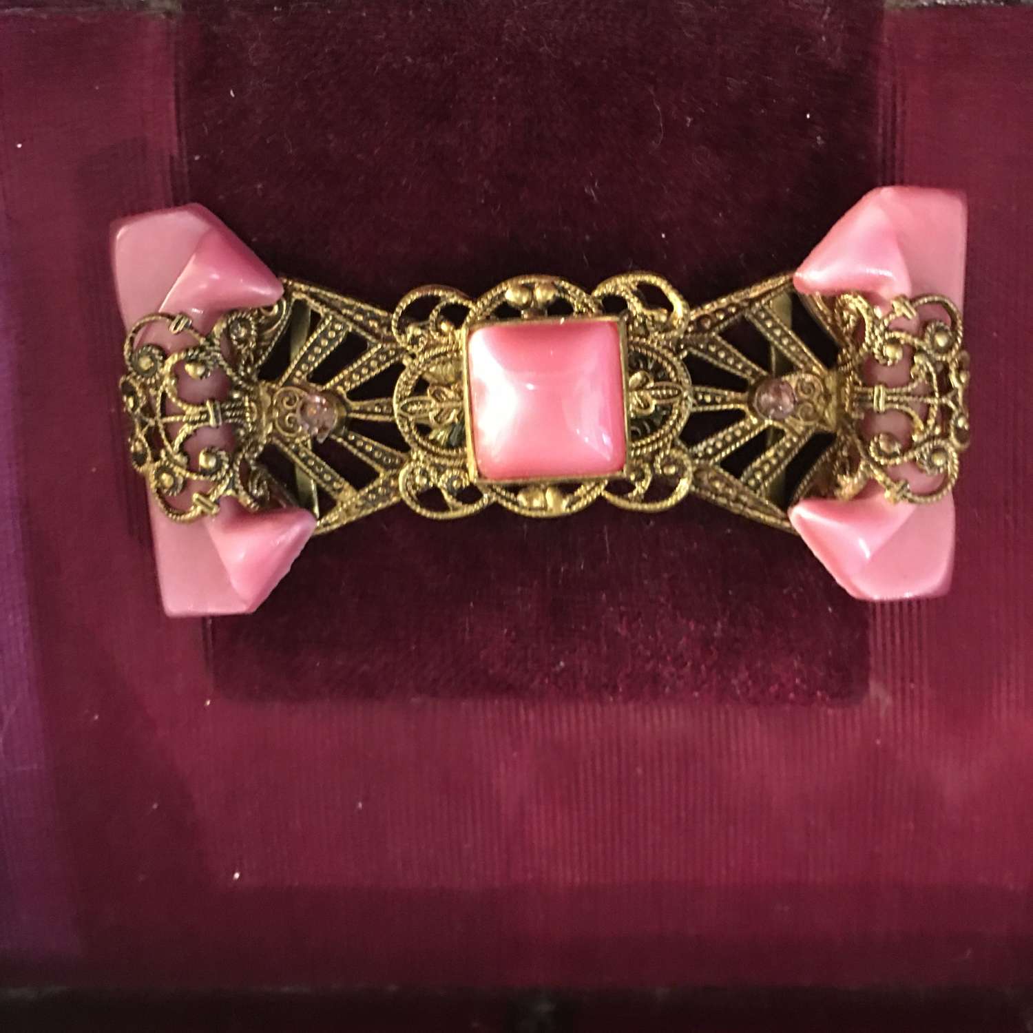Vintage pink and gilt lucite buckle
