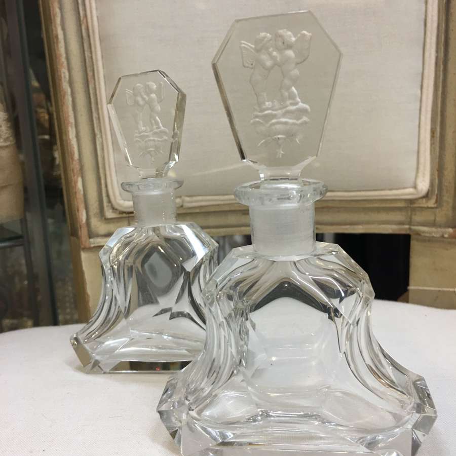 A pair of glass Art Deco perfume bottles
