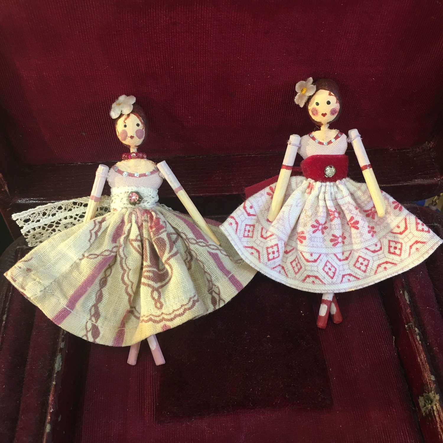Tiny paper clay dolls with clothing made from vintage fabric and trims