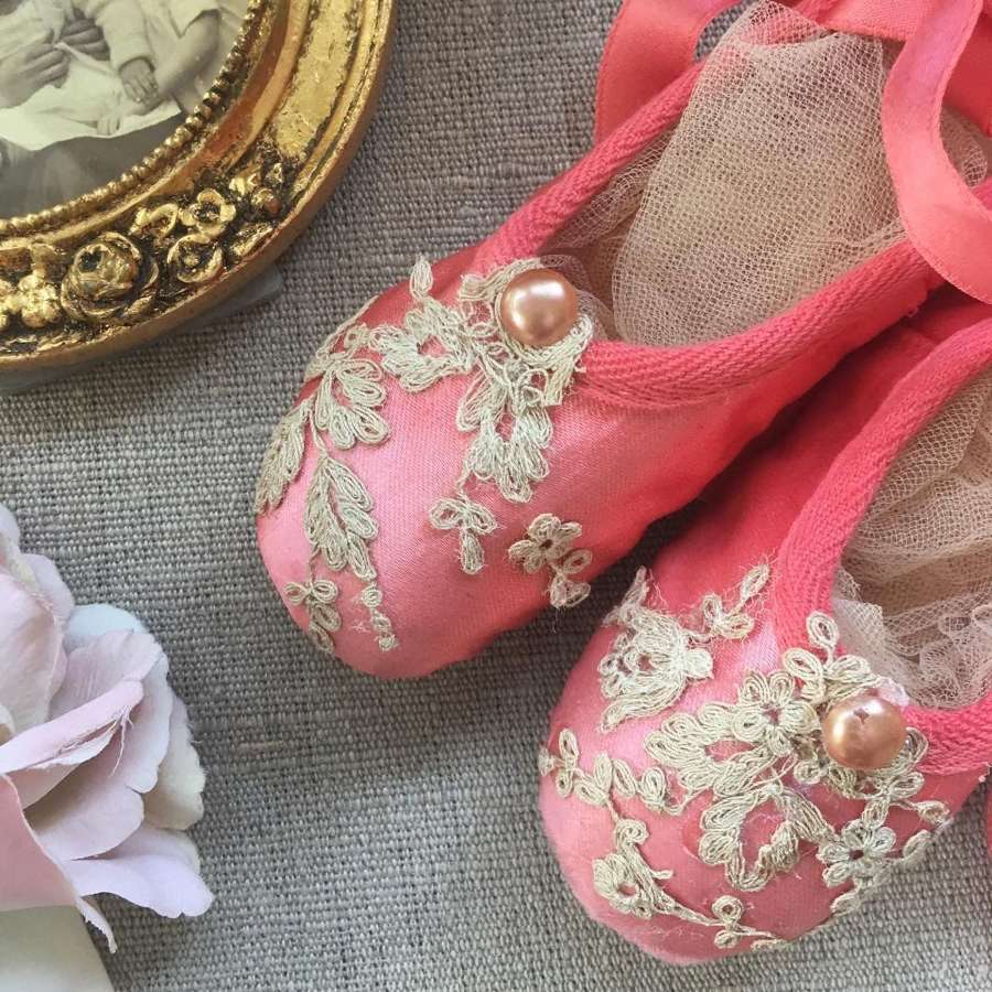 Pretty coral ballet shoes with antique lace