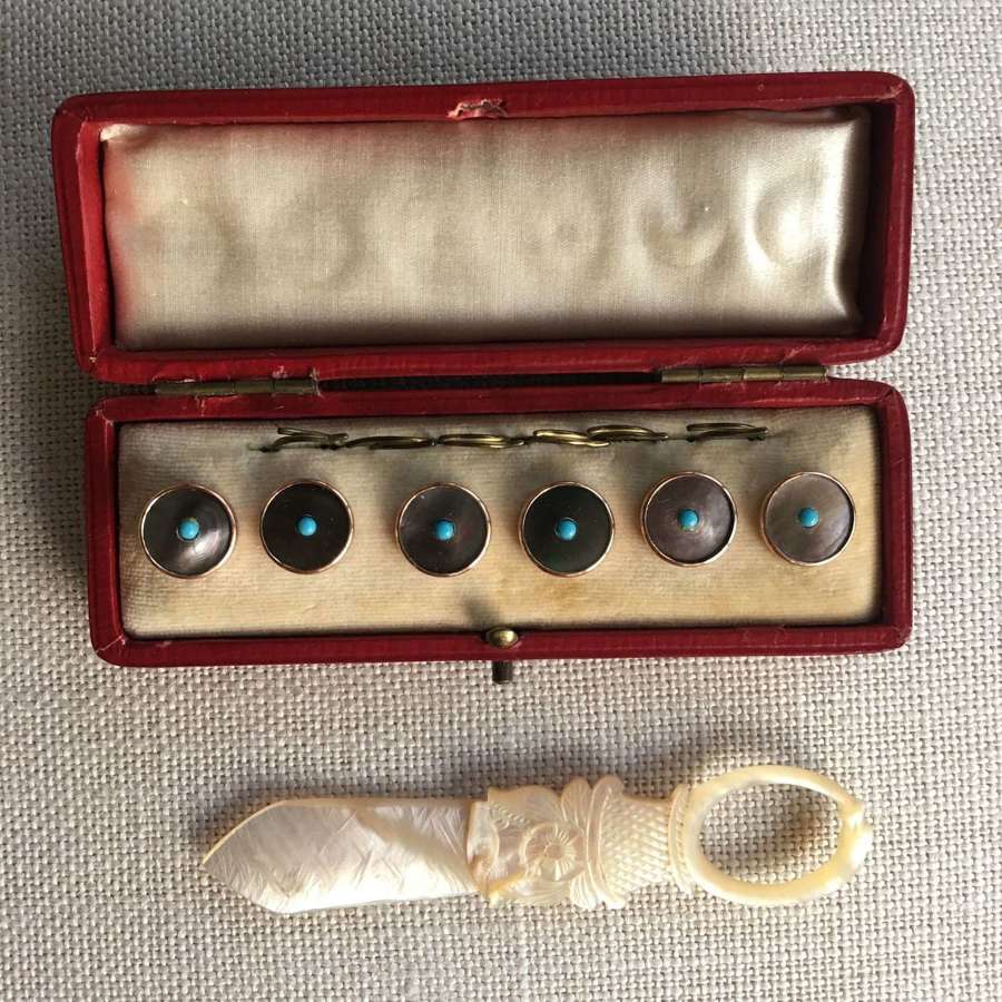 Antique mother of pearl buttons in original box
