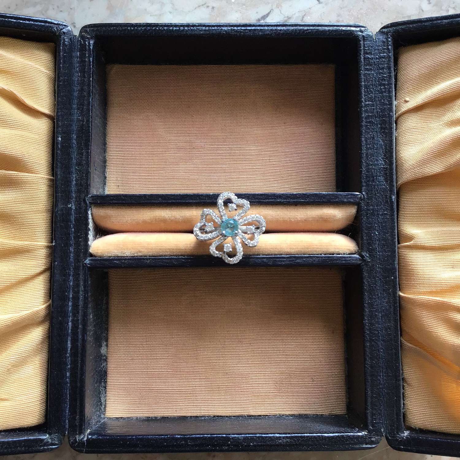 Sterling silver clover ring with blue topaz and cubic zirconia