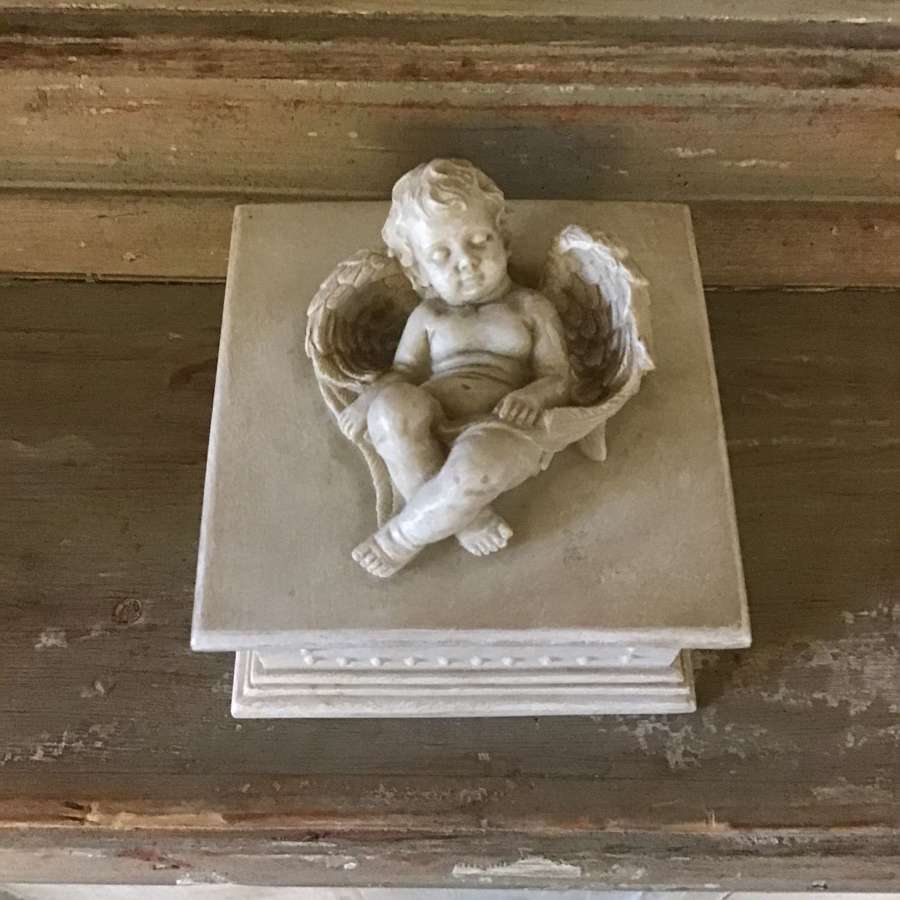 A vintage style resin cherub box