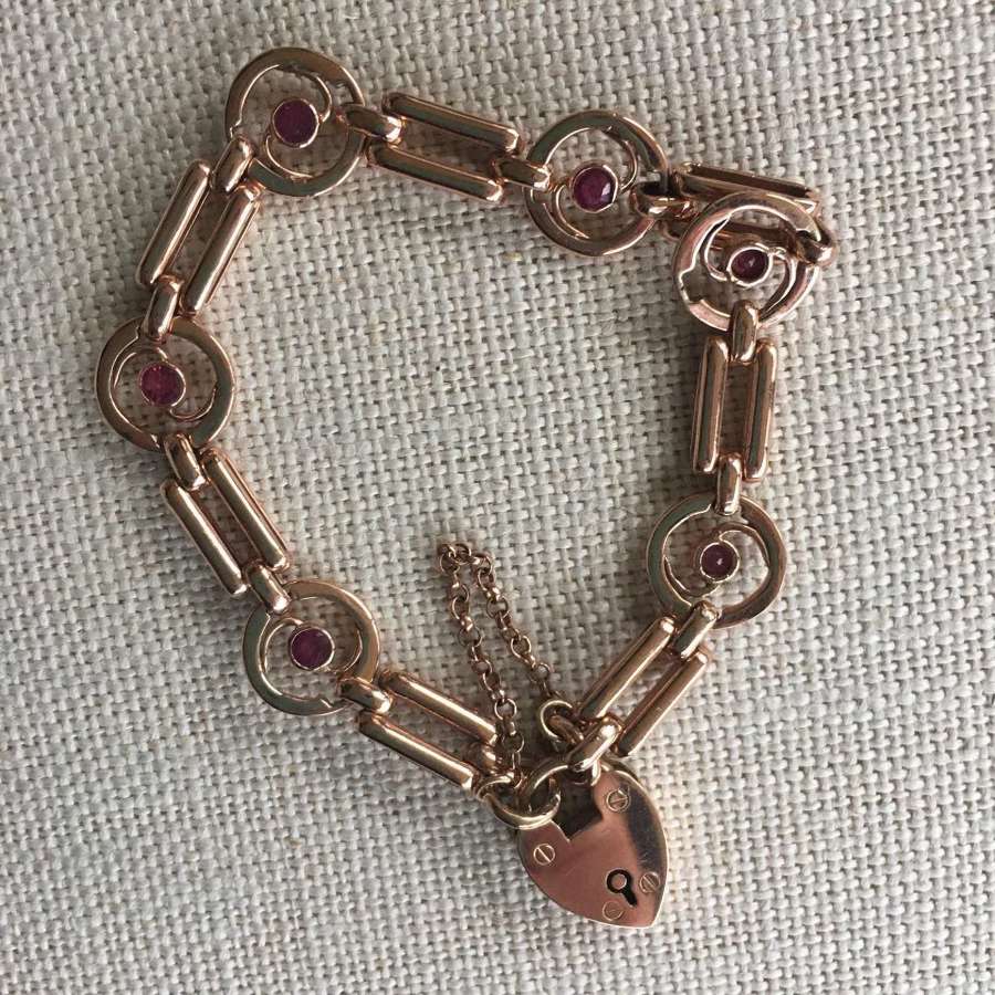 9ct rose gold and garnet gate bracelet
