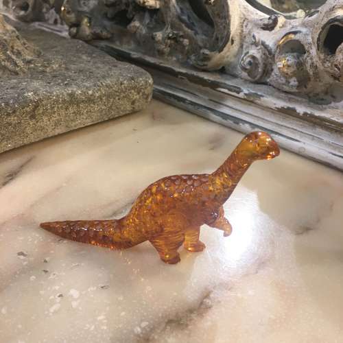 Amber dinosaur ornament
