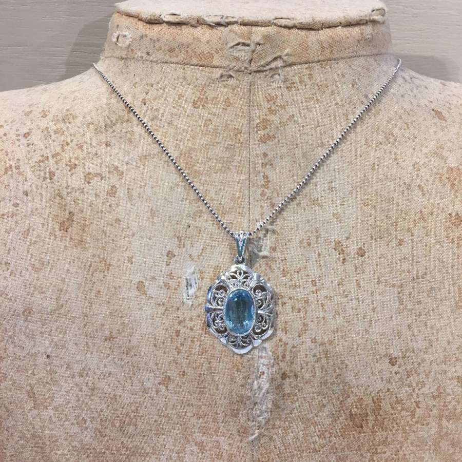 Silver and blue topaz necklace