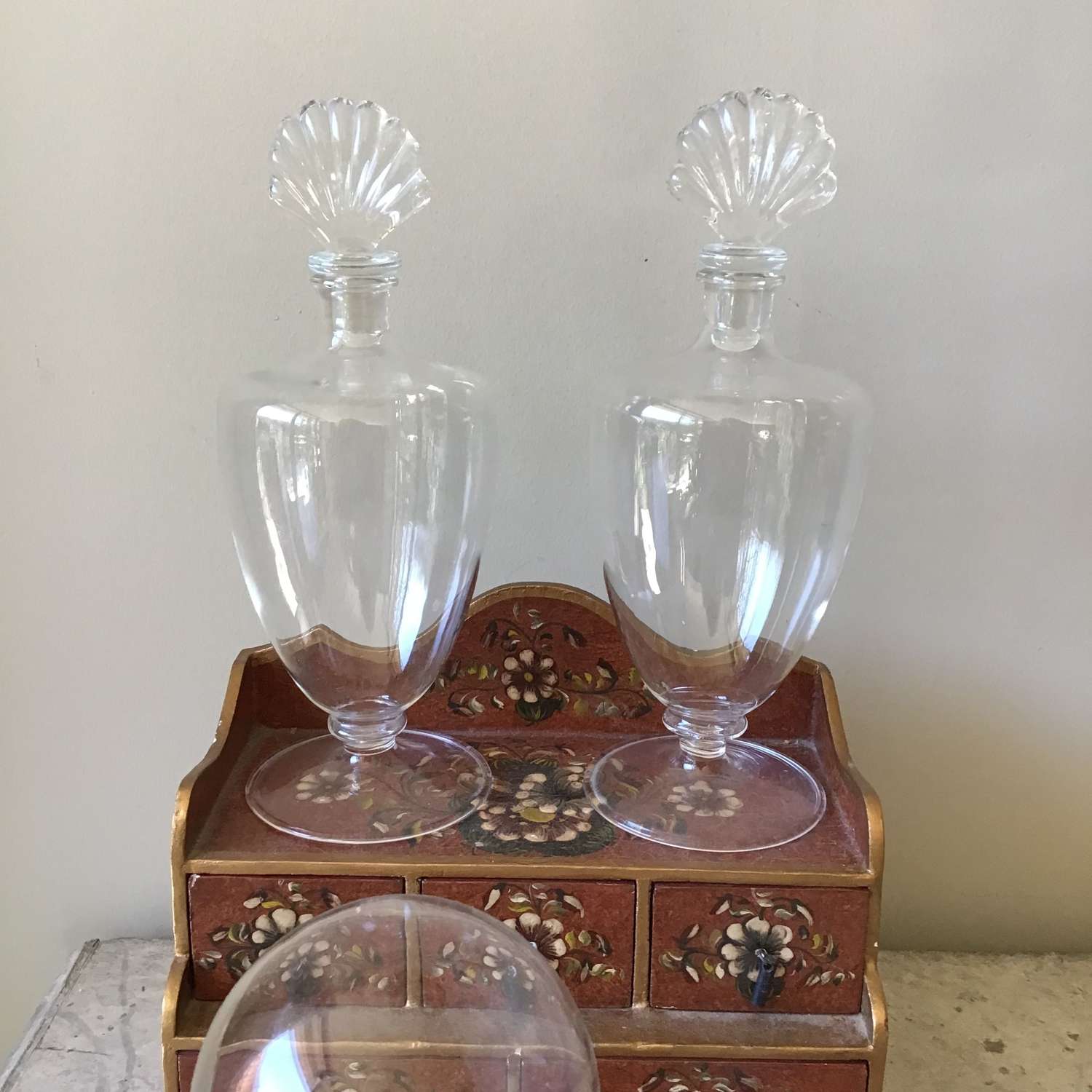 A pair of shell glass lotion bottles, also available separately
