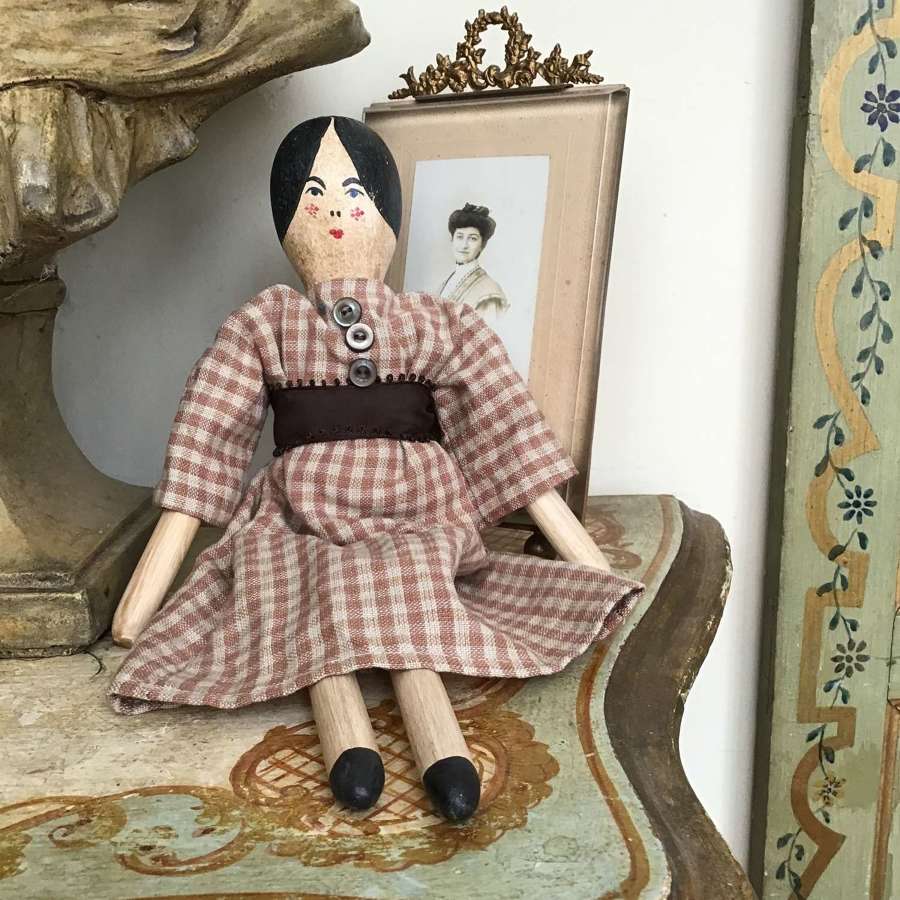 Vintage clothed wooden peg doll