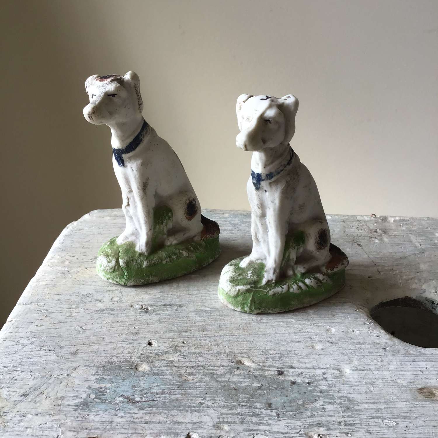 Pair of antique dog figures