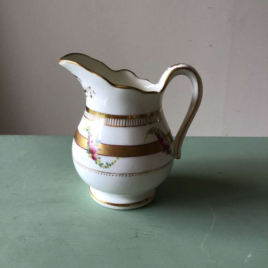 Small jug/vase with gold and pink rose sprays