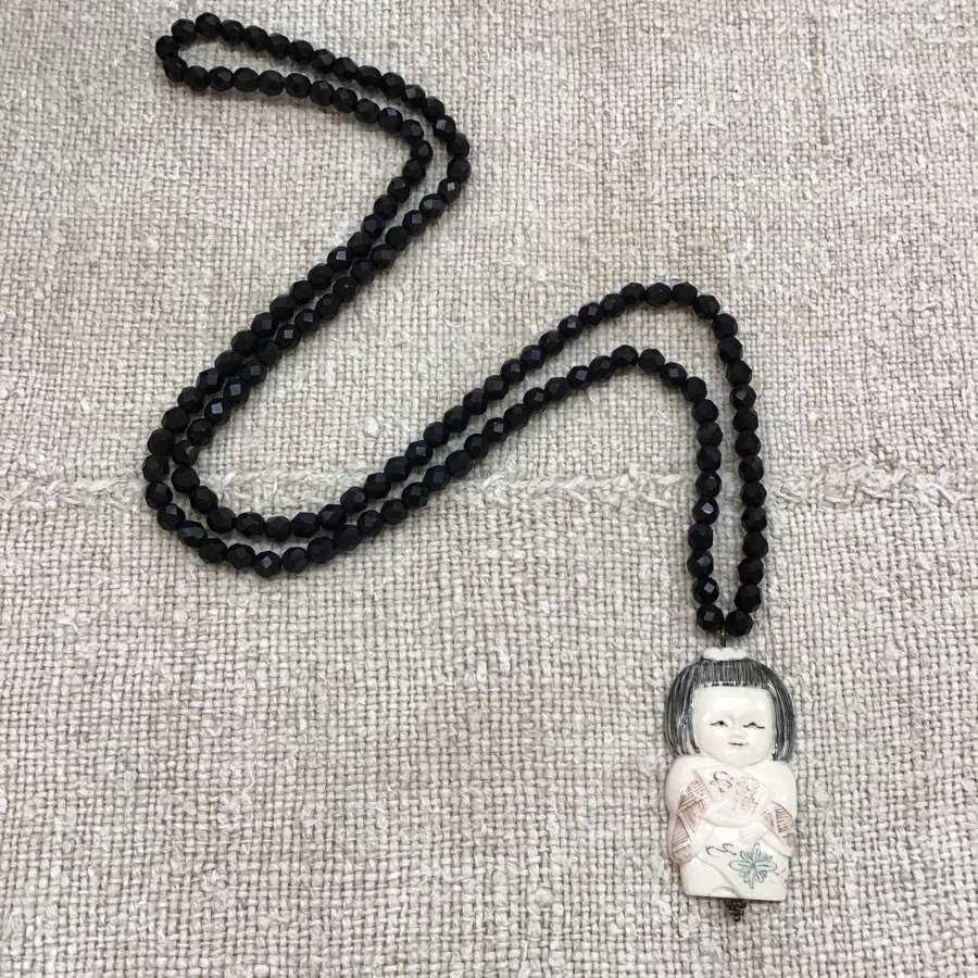 Faceted Matt black onyx bead necklace with bone pendant Chinese girl