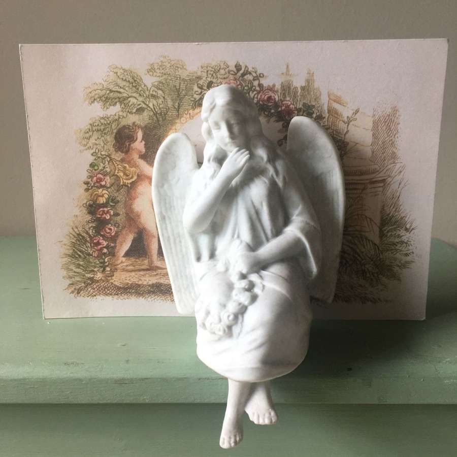 Victorian bisque seated angel (decoration for Christening cake)