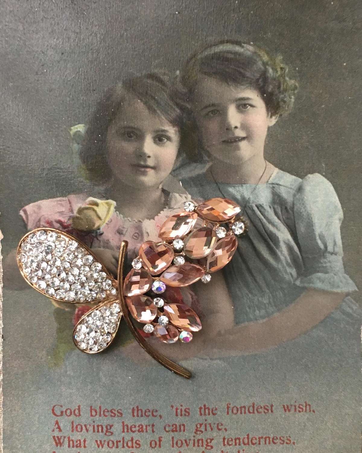 Antique greeting card with butterfly brooch