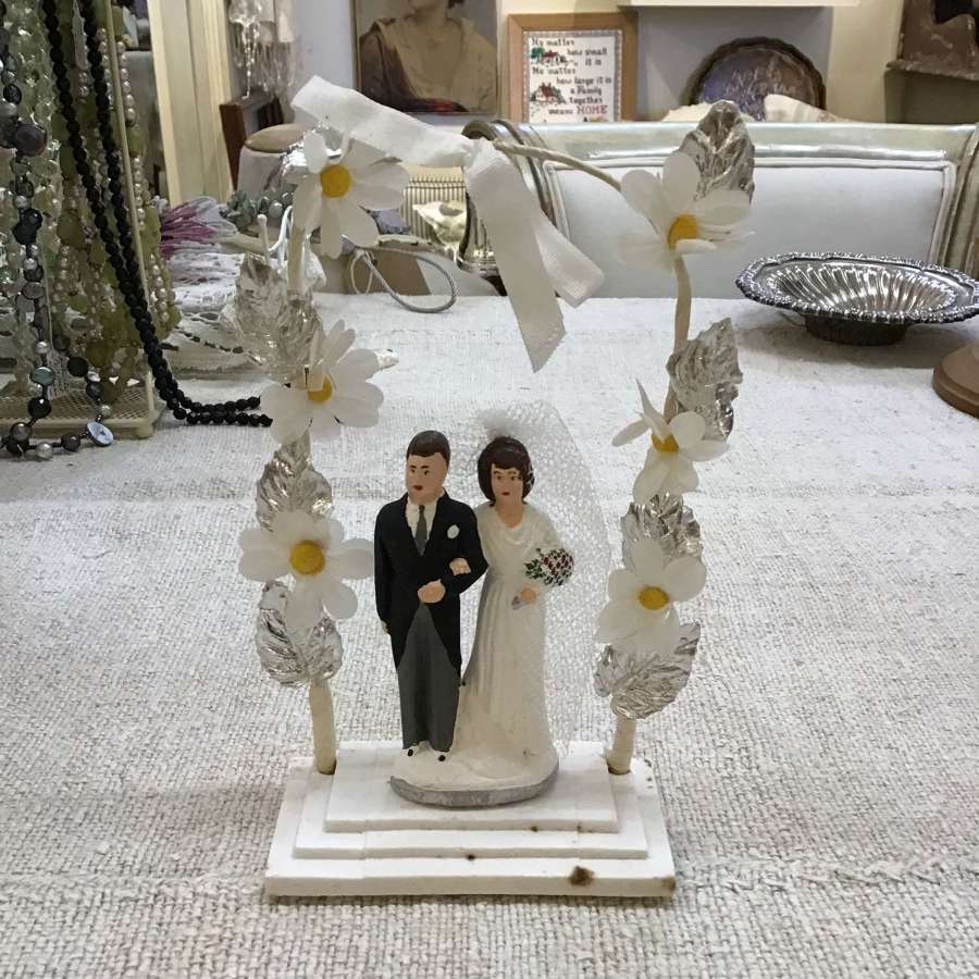 Vintage wedding cake topper with archway & bell