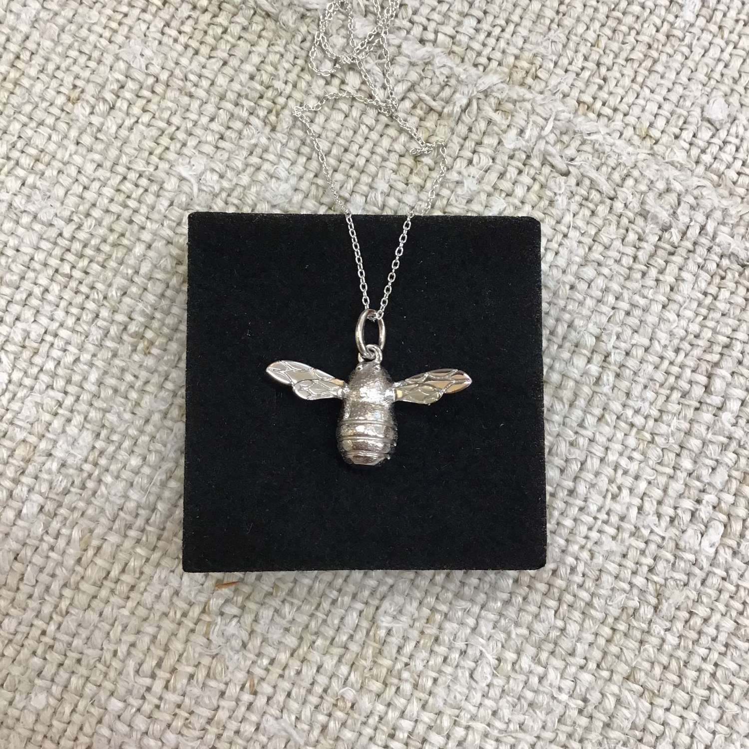 Solid silver bee pendant