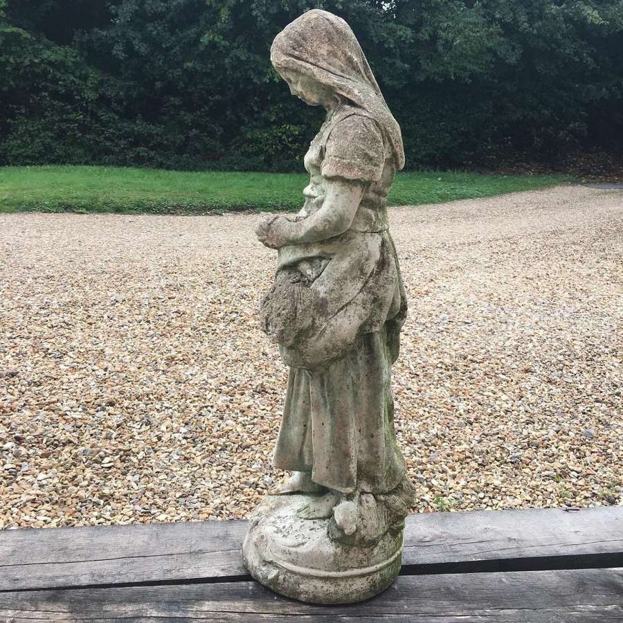 Vintage garden statue of maiden