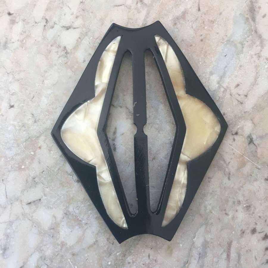 Vintage black and cream plastic buckle