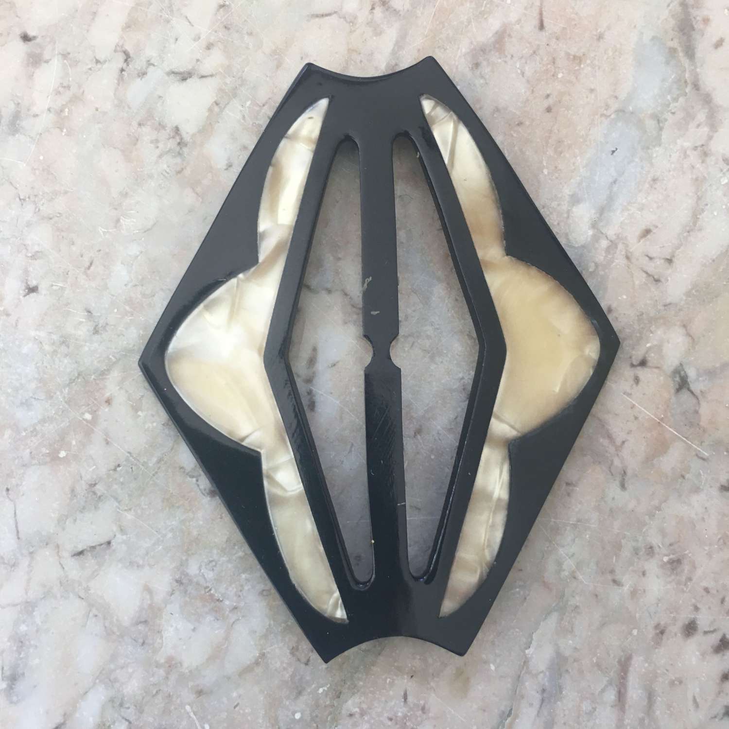 Vintage black and cream plastic buckle