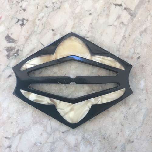 Vintage black and cream plastic buckle