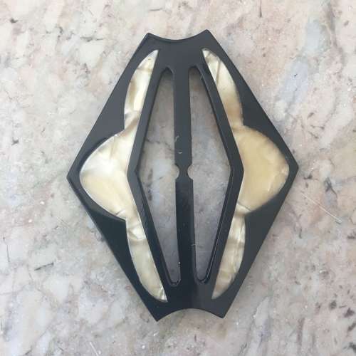 Vintage black and cream plastic buckle