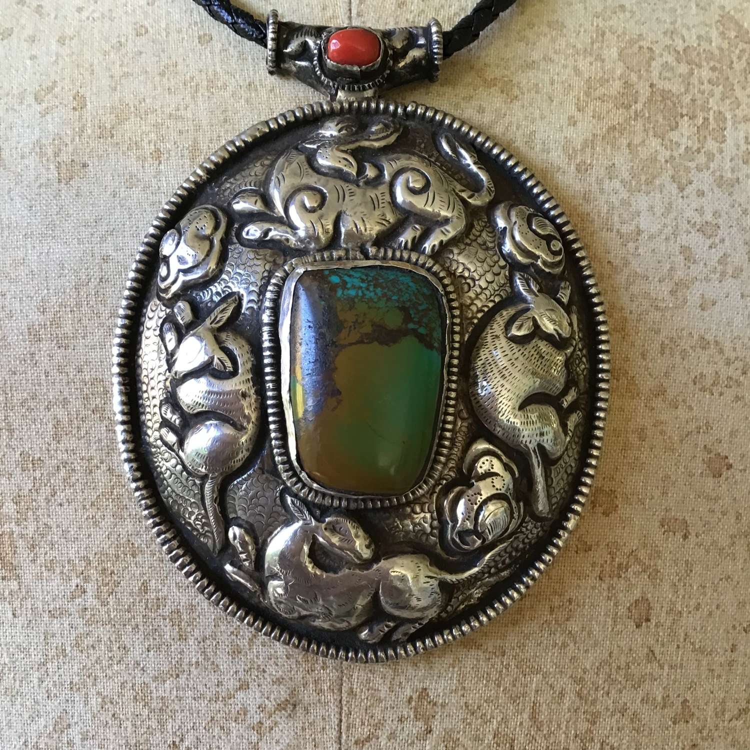 Ladakh silver oval pendant with coral and turquoise from Tibet
