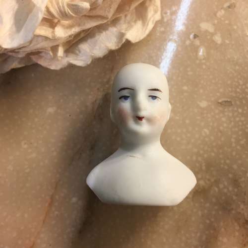 Antique bisque doll head