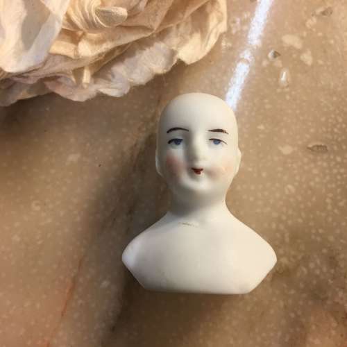 Antique bisque doll head
