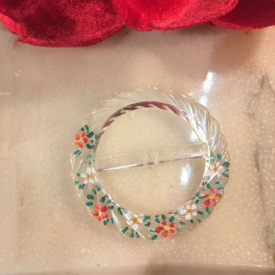 1950’s clear floral lucite/plastic round buckle