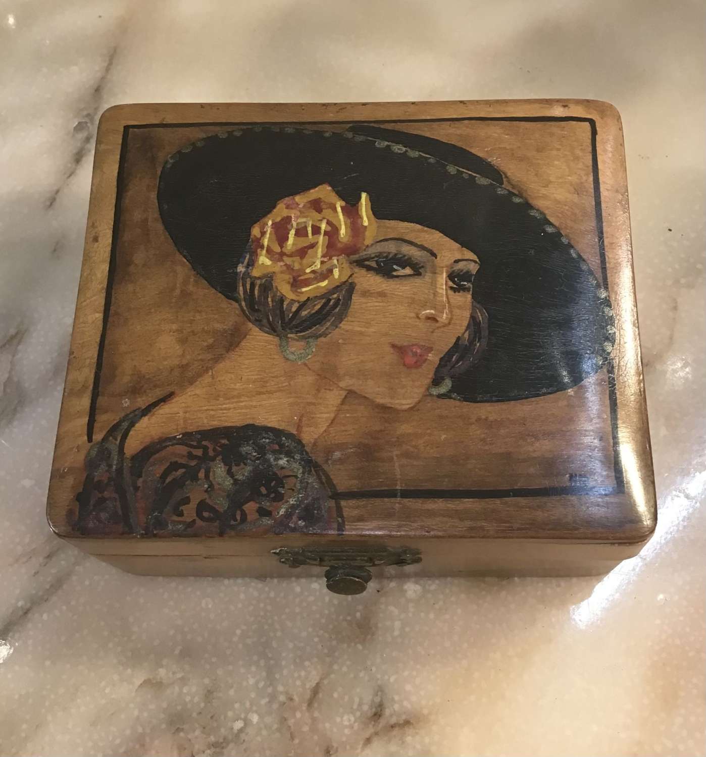 Vintage wooden box decorated with lady in a hat