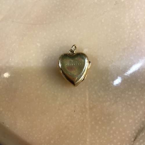 Antique heart shaped 9ct gold locket