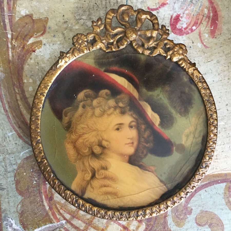 Antique bow topped round frame
