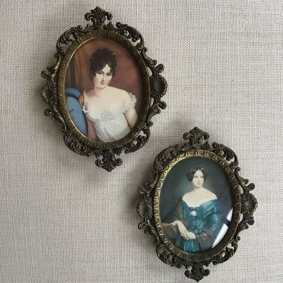 Pair of vintage metal framed prints