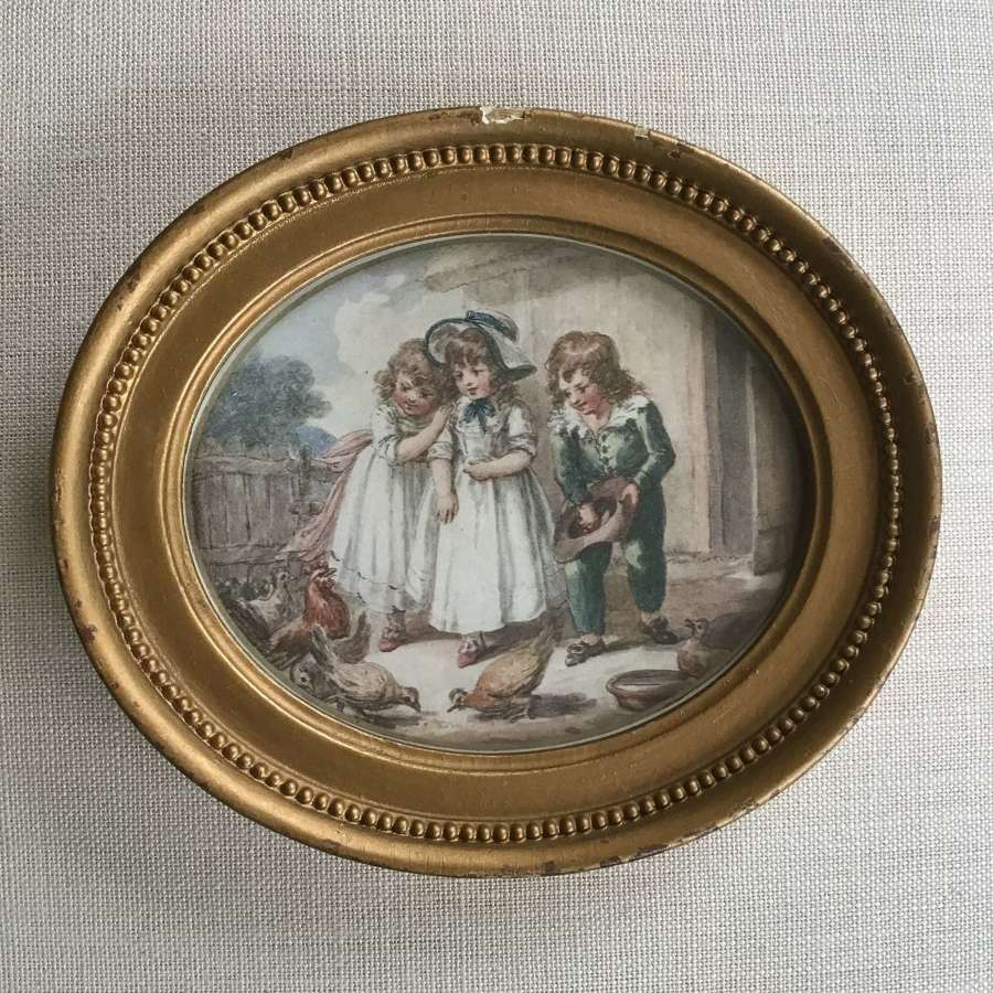 Antique gilded wooden oval framed print of three children