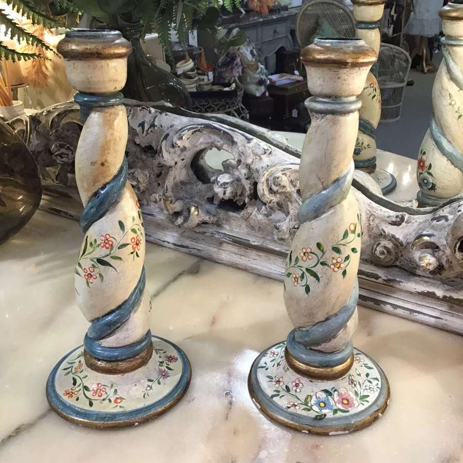 Pair of vintage painted wooden candlesticks
