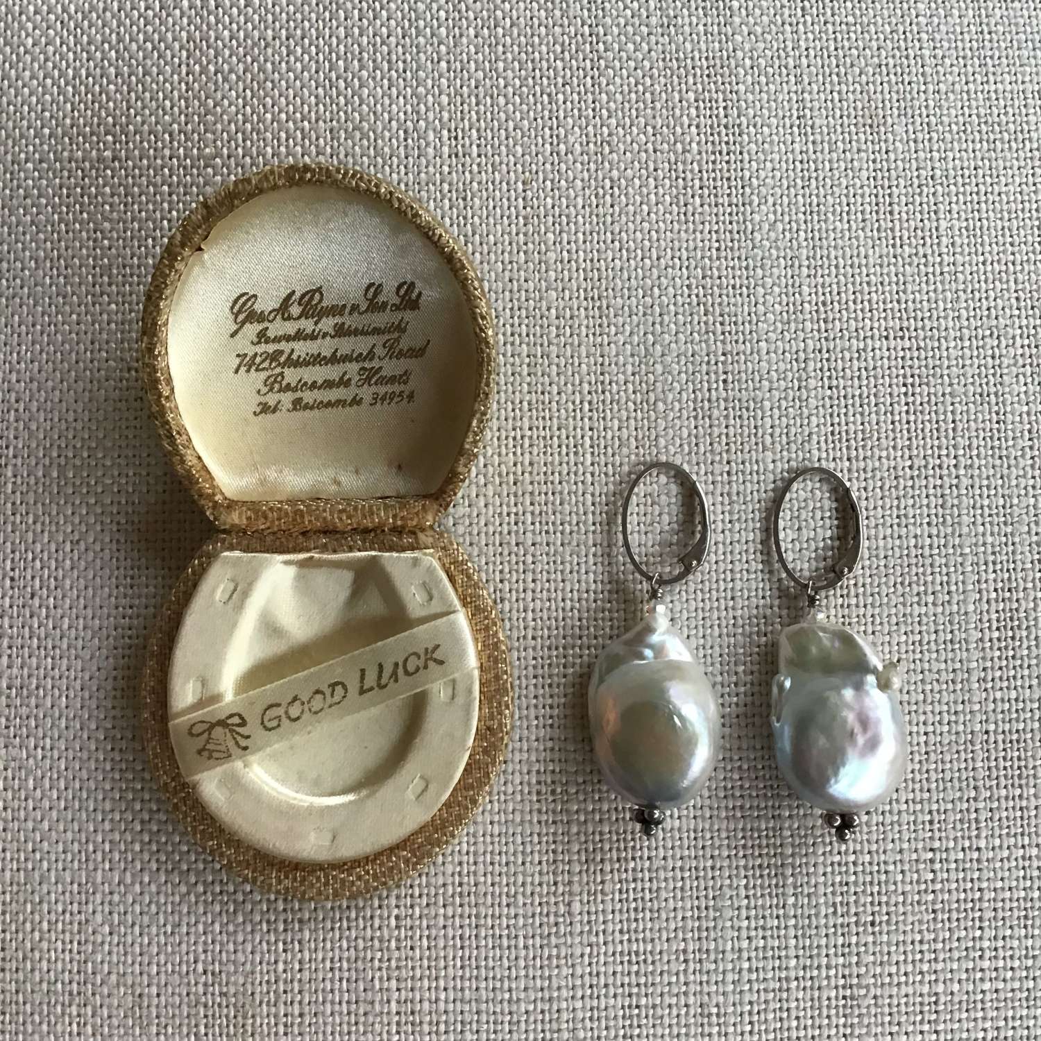Large silver baroque pearl drop earrings