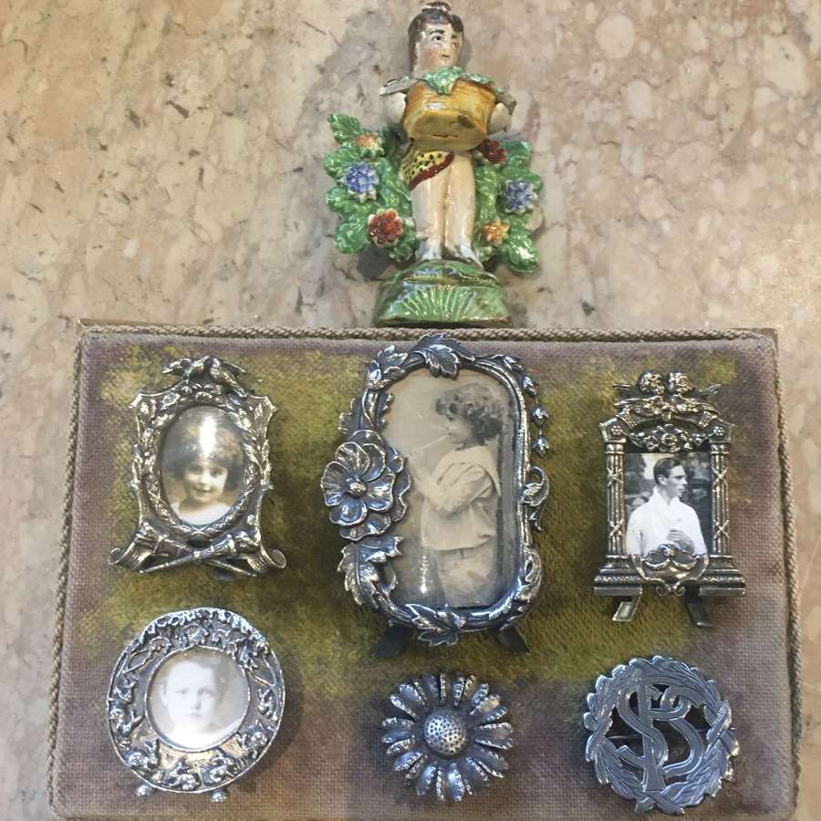 A selection of small silver plated decorative frames