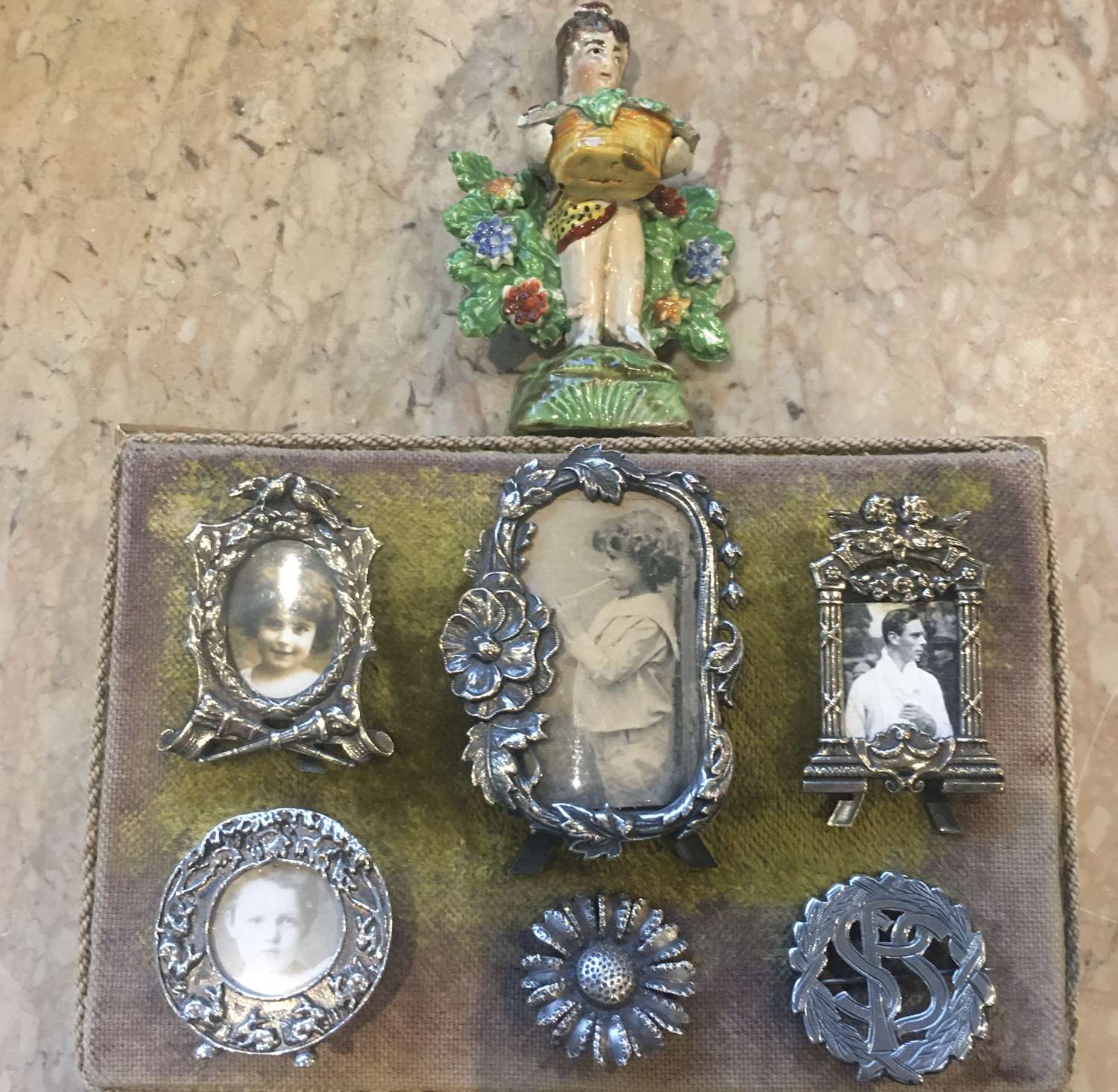 A selection of small silver plated decorative frames
