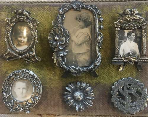 A selection of small silver plated decorative frames