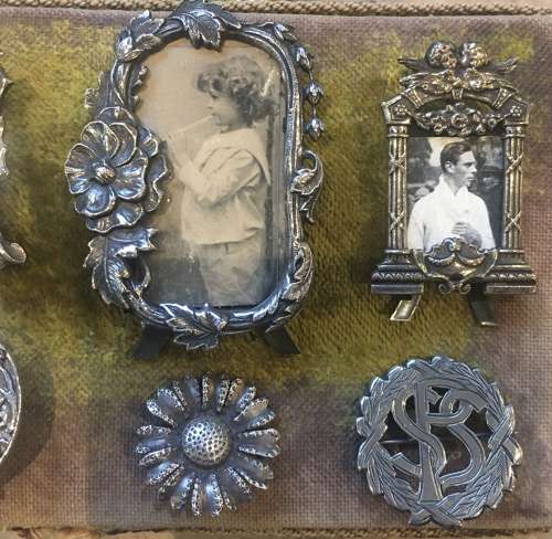 A selection of small silver plated decorative frames
