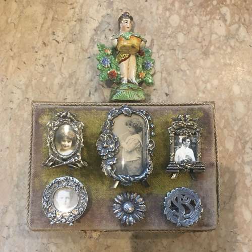 A selection of small silver plated decorative frames