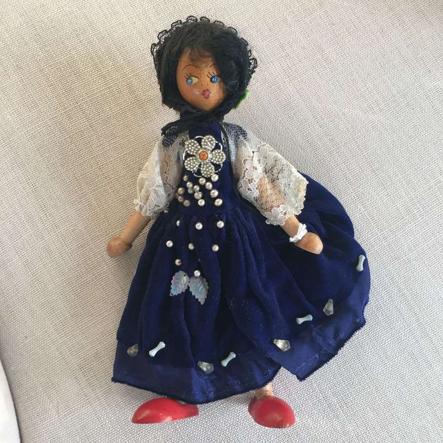 Vintage wooden dressed dolly